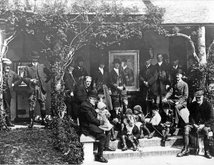 FamilygroupMichelstandingbyhisportraitatTreboroughLodge